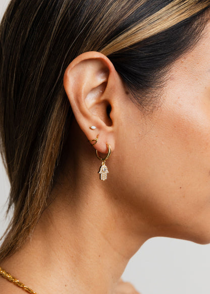 dangling hamsa cz earrings