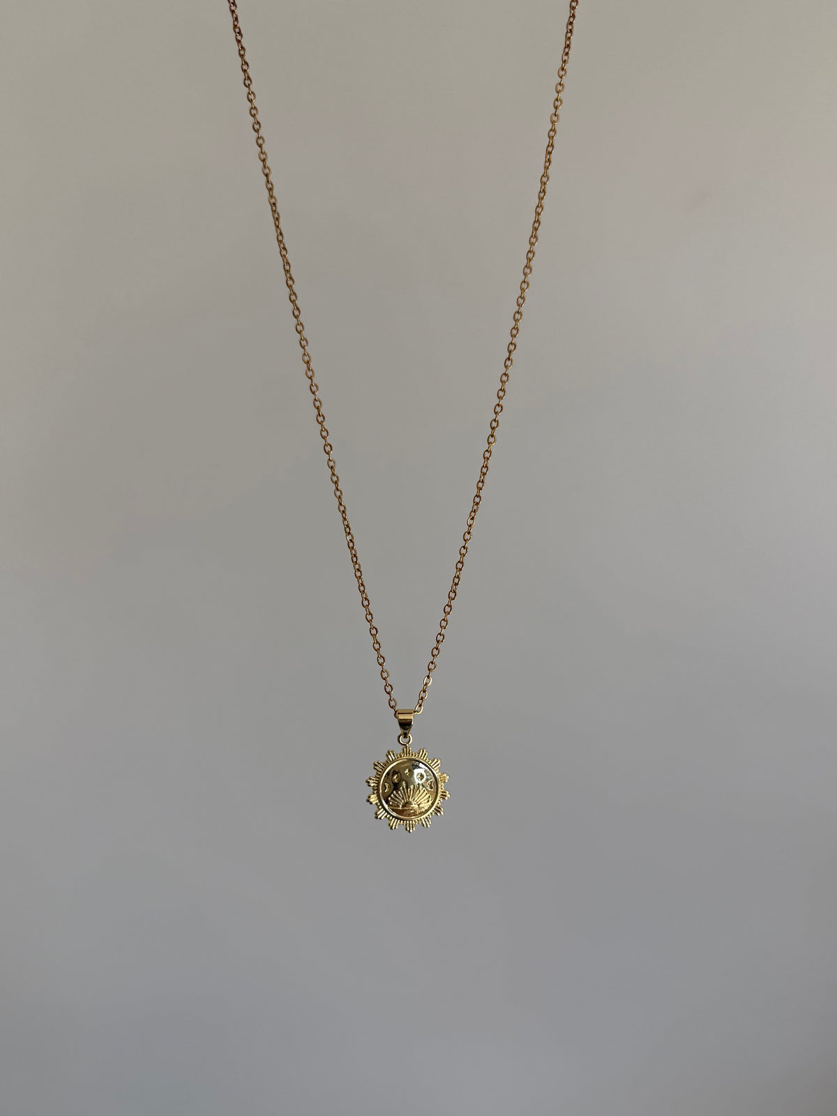 golden sun necklace